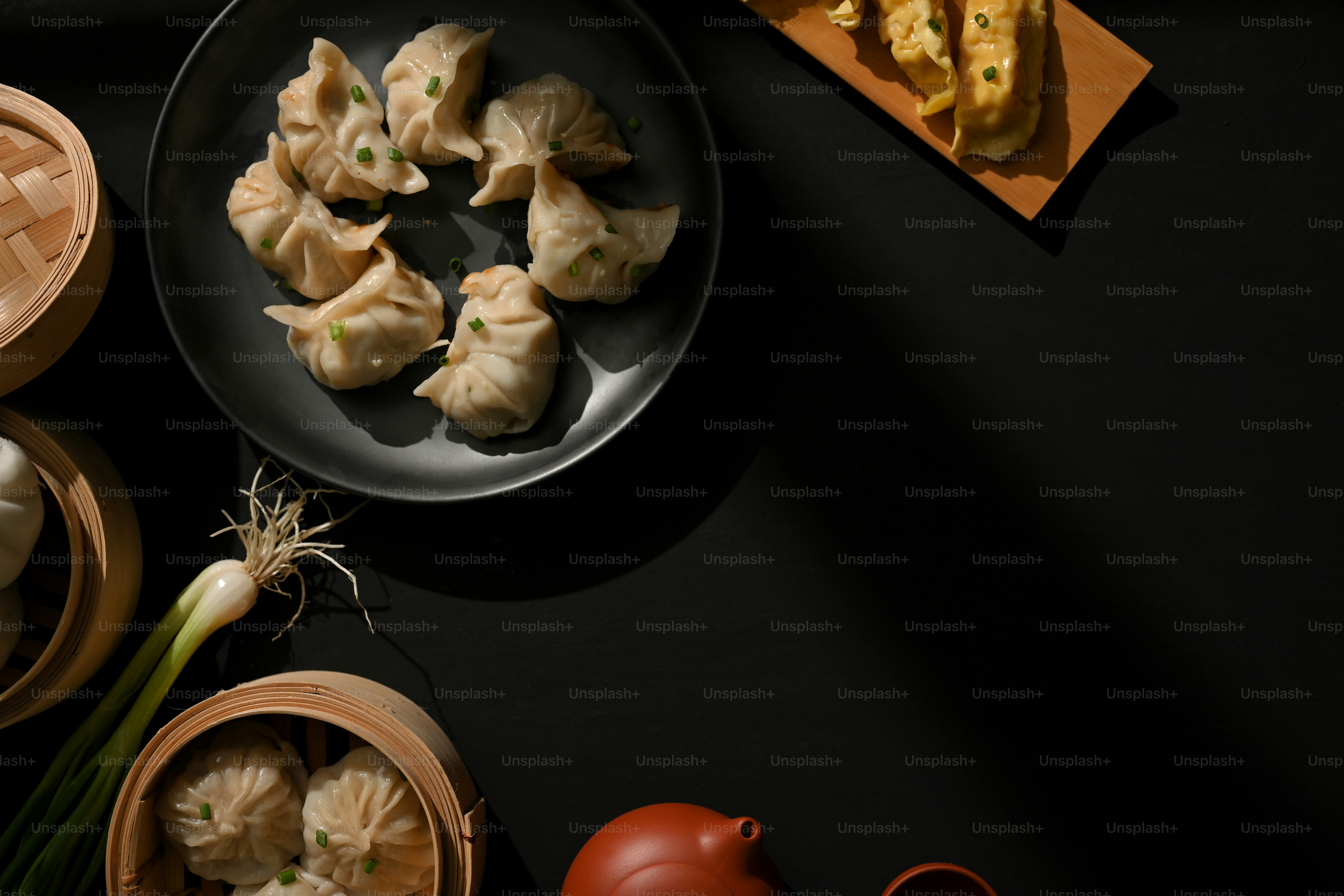 Top view of the table with Dimsum dumplings, tea pot and copy space in ...