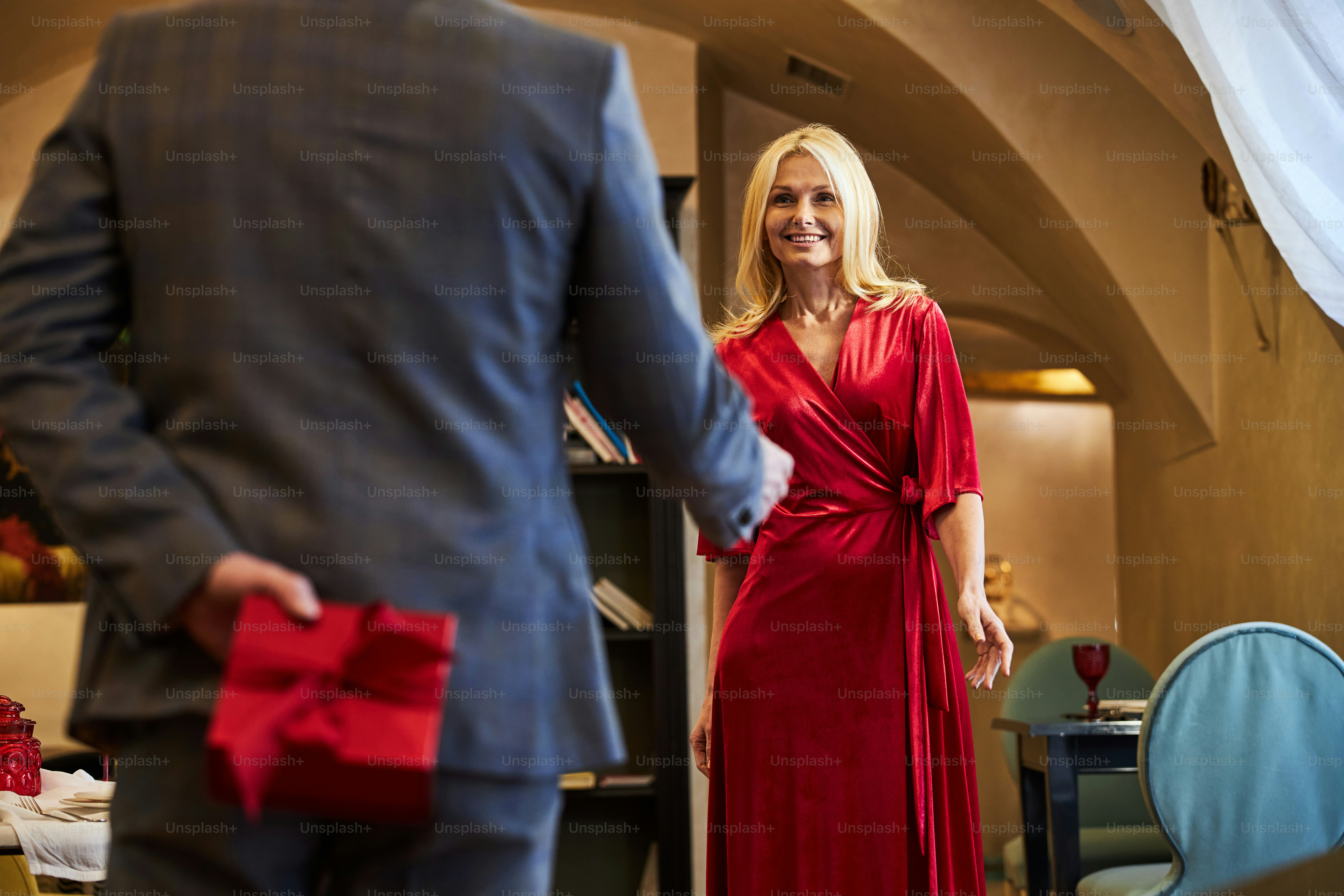 Executive receiving luxury corporate gifts during client appreciation event