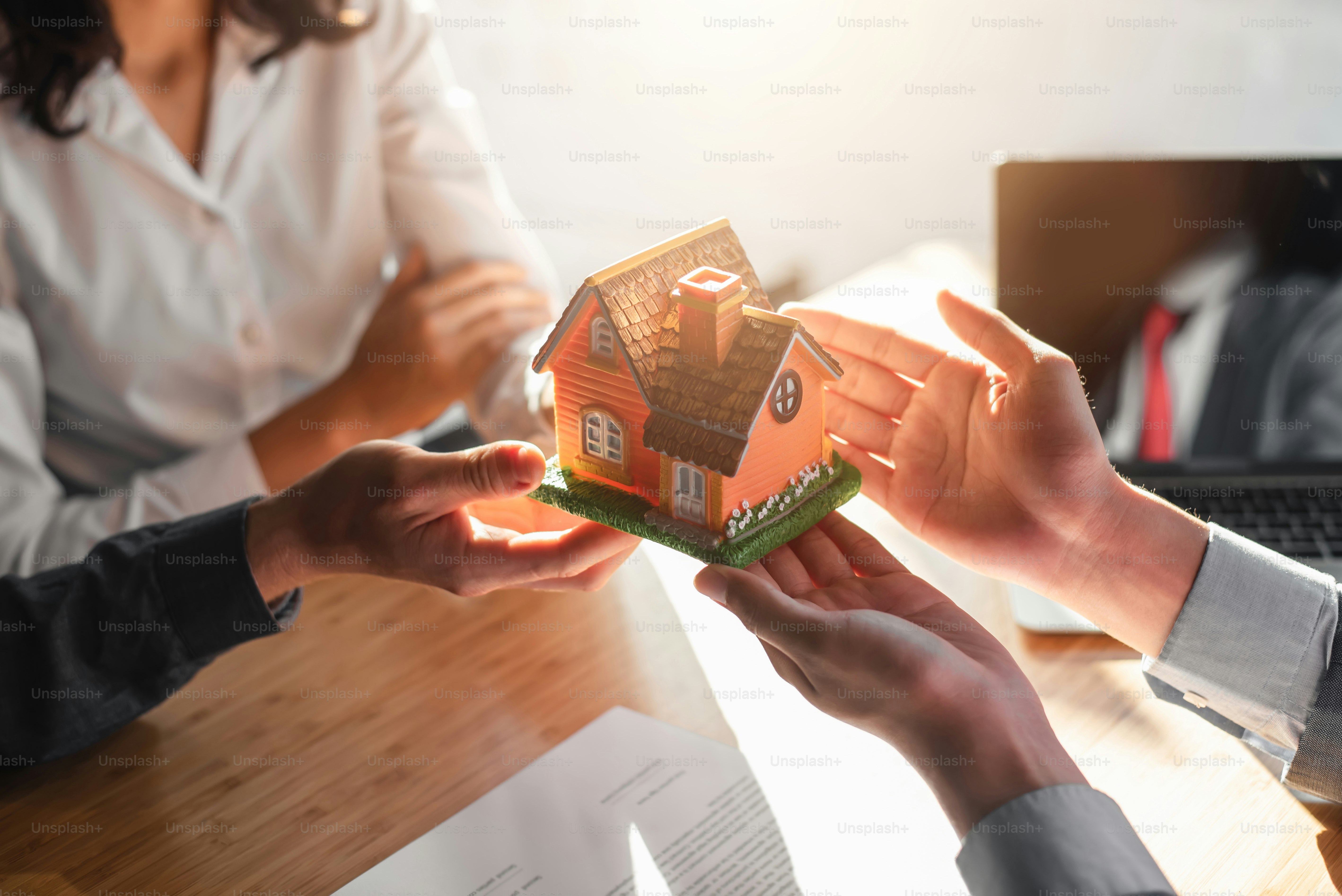 Business Signing a Contract Buy - sell house.
