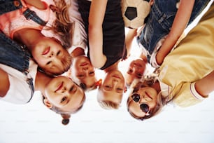 Portrait of kids that standing together and posing for the camera.