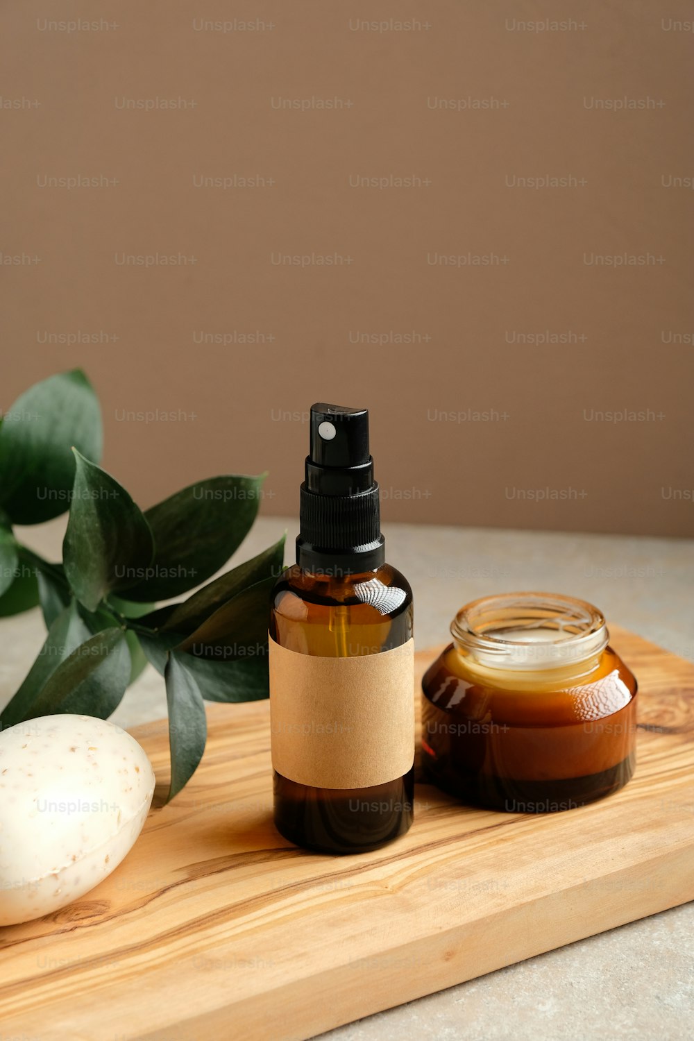 Set of natural organic cosmetics for personal hygiene on wooden board. Beauty treatment and spa concept.
