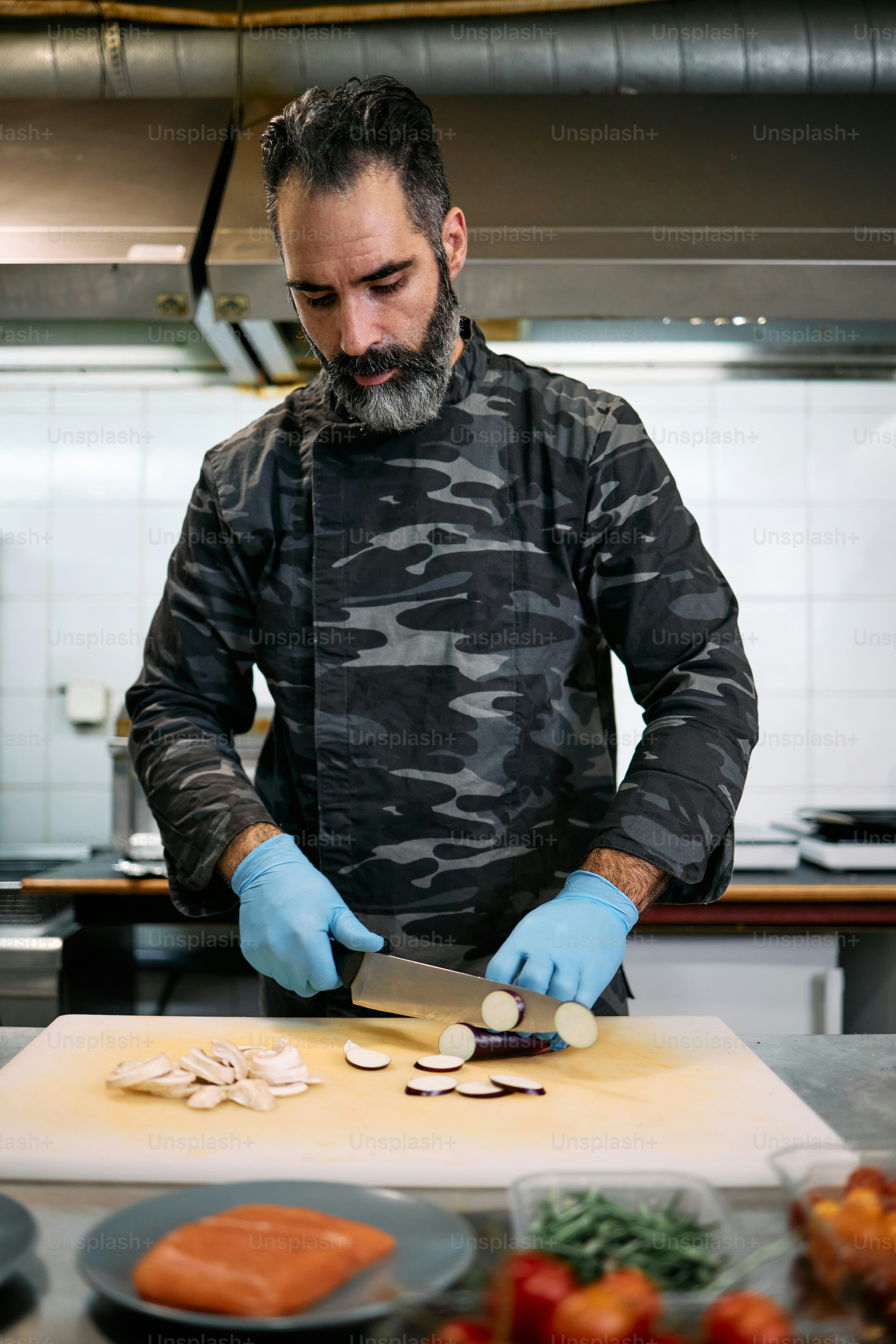 Professional military base chef or cook holds delicious tasty meal with ...