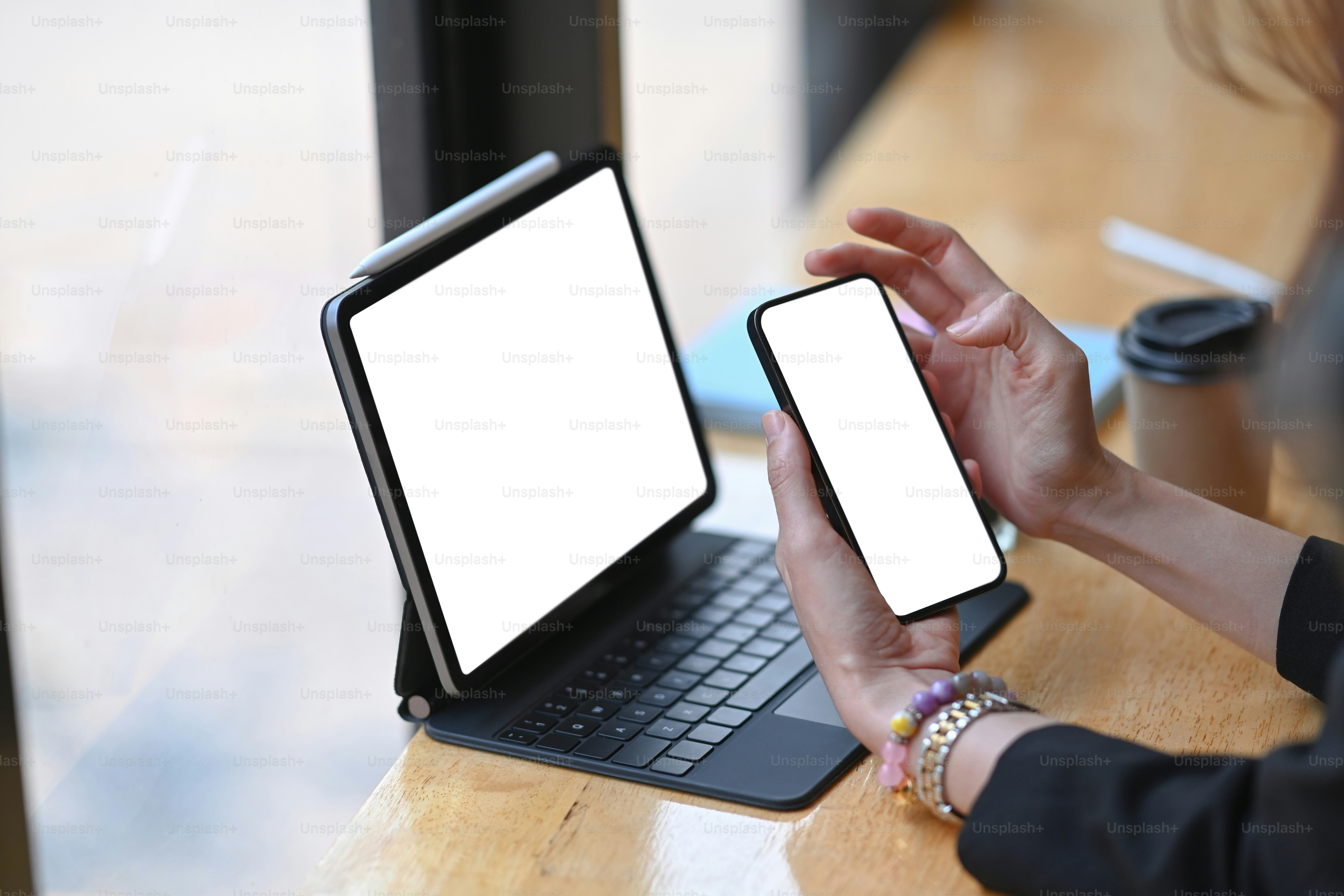 Woman holding mock up mobile phone with blank screen. Blank screen for your advertising text .