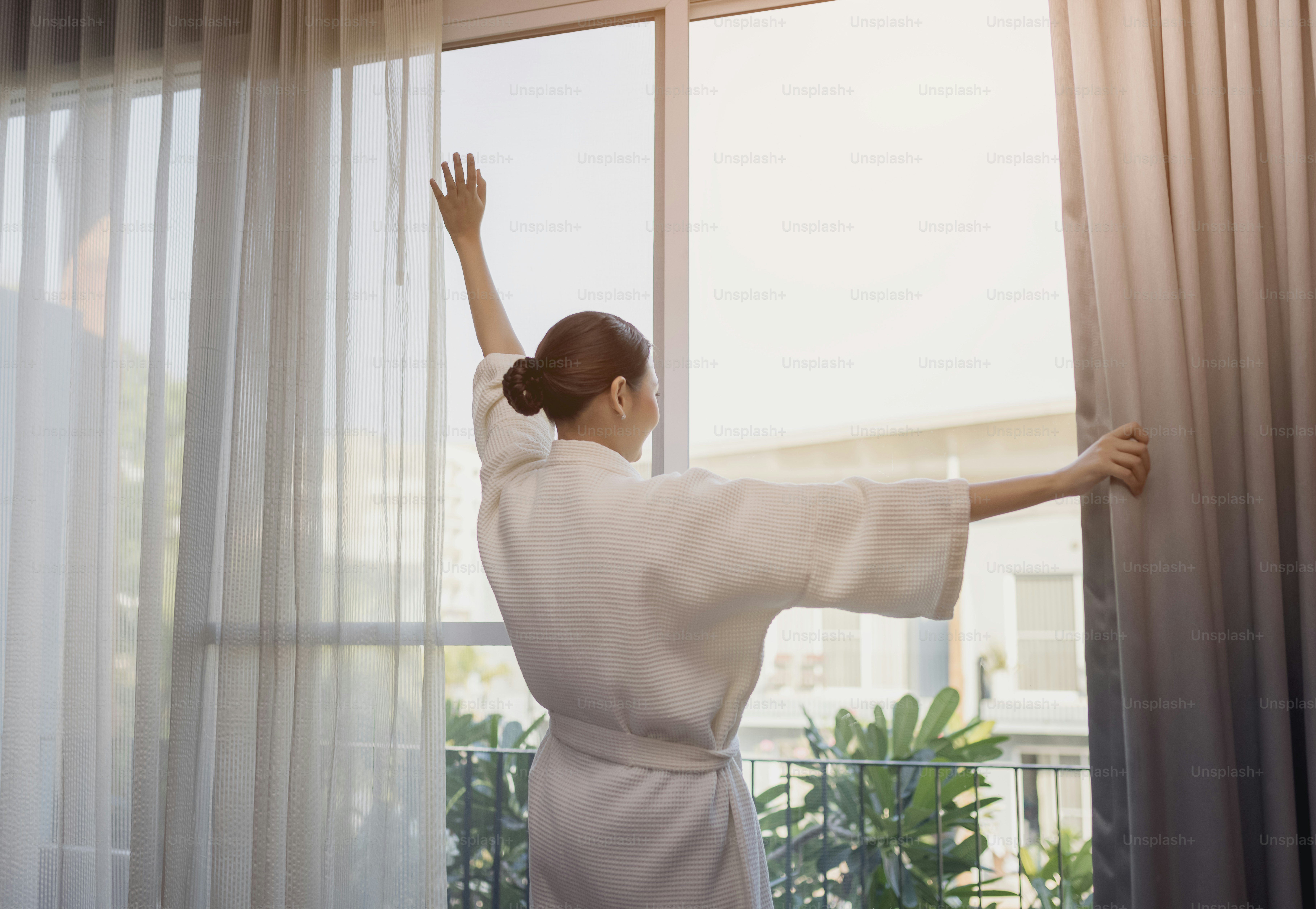 Traveller beautiful asian woman smile to look over there stay near the door in hotel room