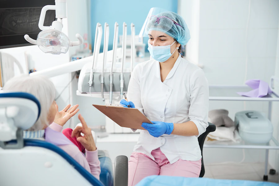 Dental professional caring for diverse patient
