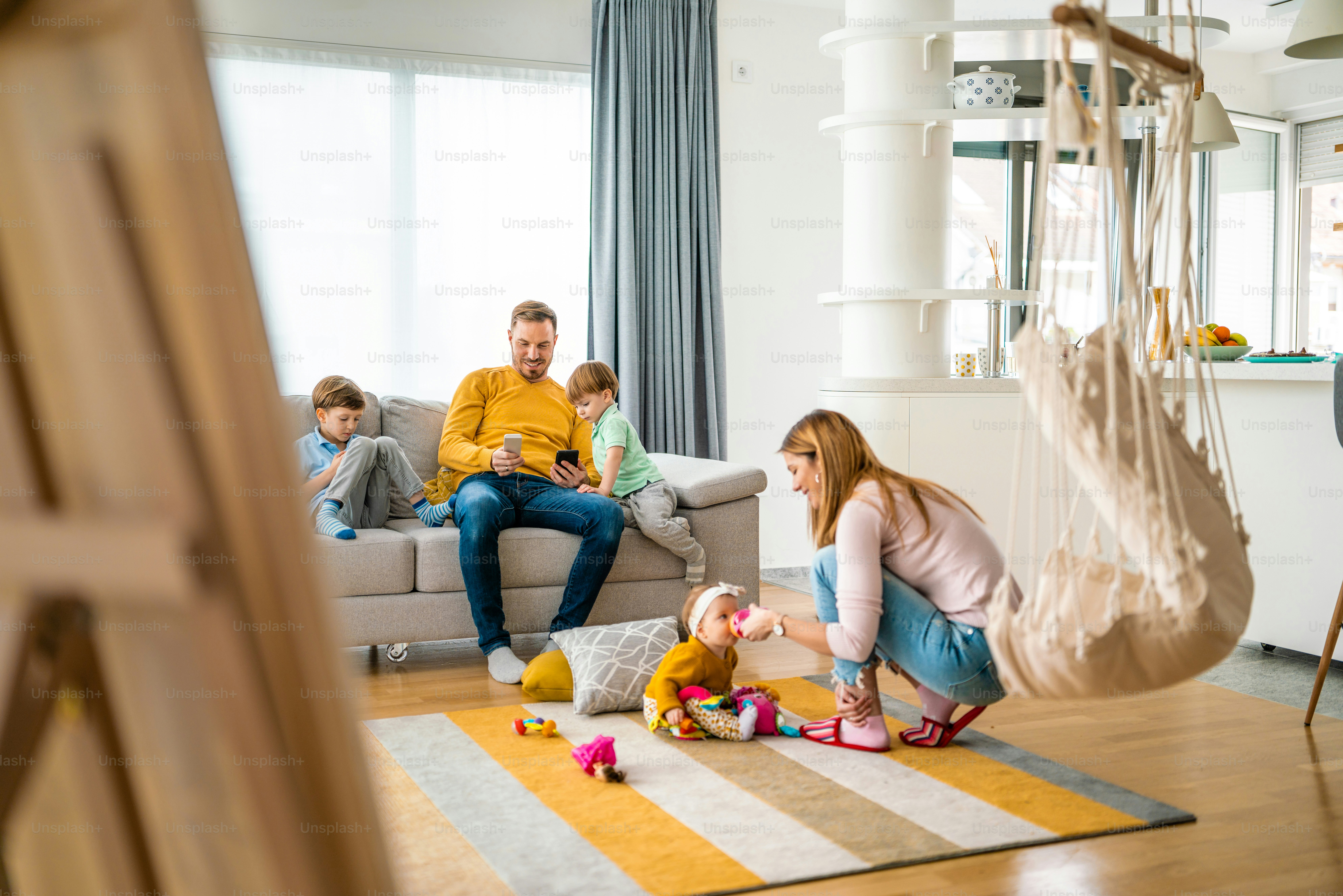 Organized family living room after home decluttering project
