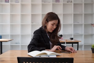 business, technology  concept - Portrait of woman hands texting message on smartphone at office