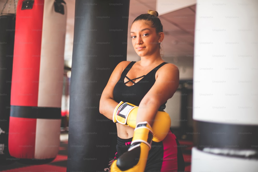 Boxer woman in gym.