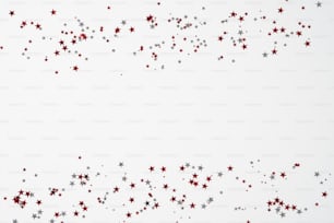 Red and white confetti stars on white background. Happy Canada Day banner design. Flat lay, top view, copy space.