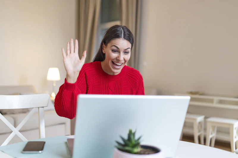 Woman using laptop at home