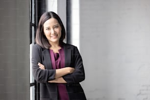 Happy portrait of a beautiful businesswoman smiling and Success.