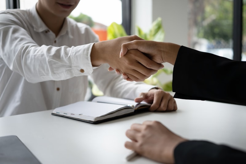 business handshake, corporate office meeting, home improvement store, retail storefront, Tokyo business district