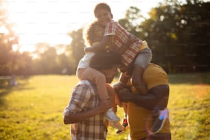 African American family having fun outdoors.