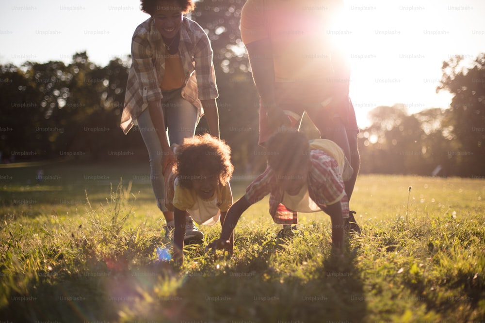 African American family having fun outdoors.