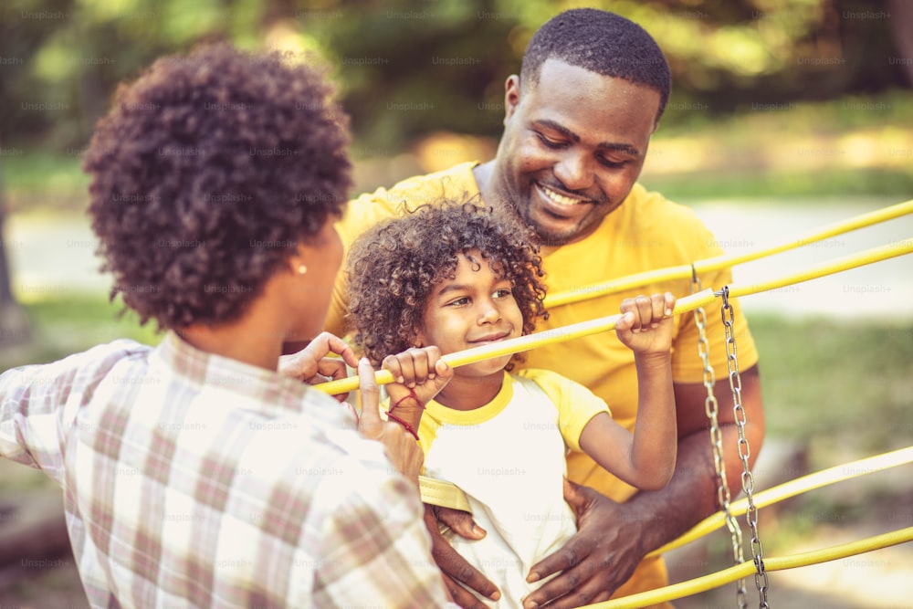 African American family having fun outdoors.