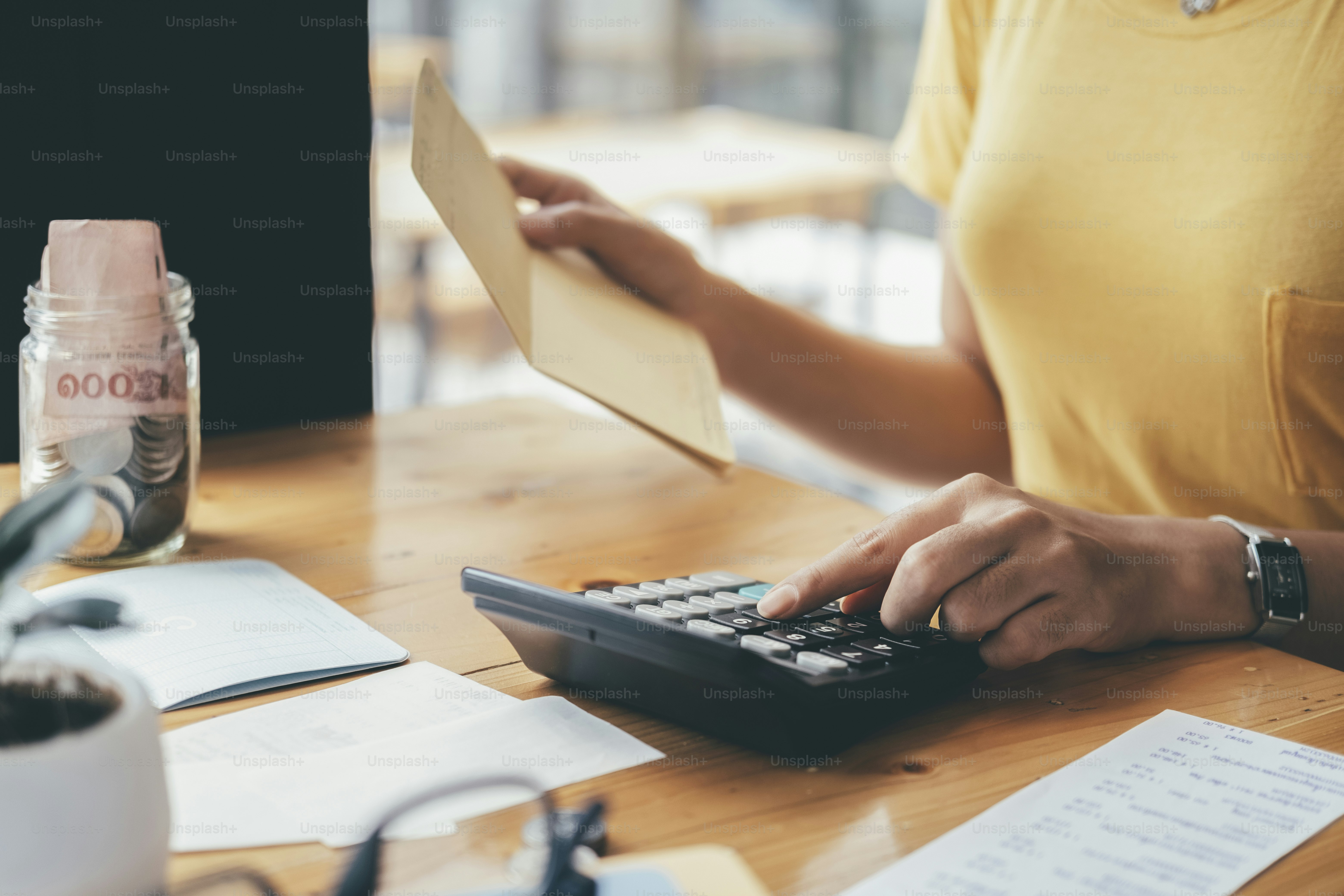 Finances Saving Economy concept. Accountant or banker calculate the cash bill