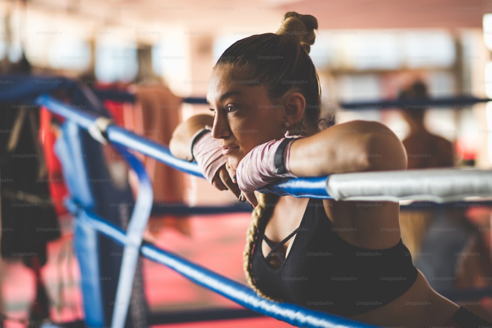 Female boxer in the boxing ring.