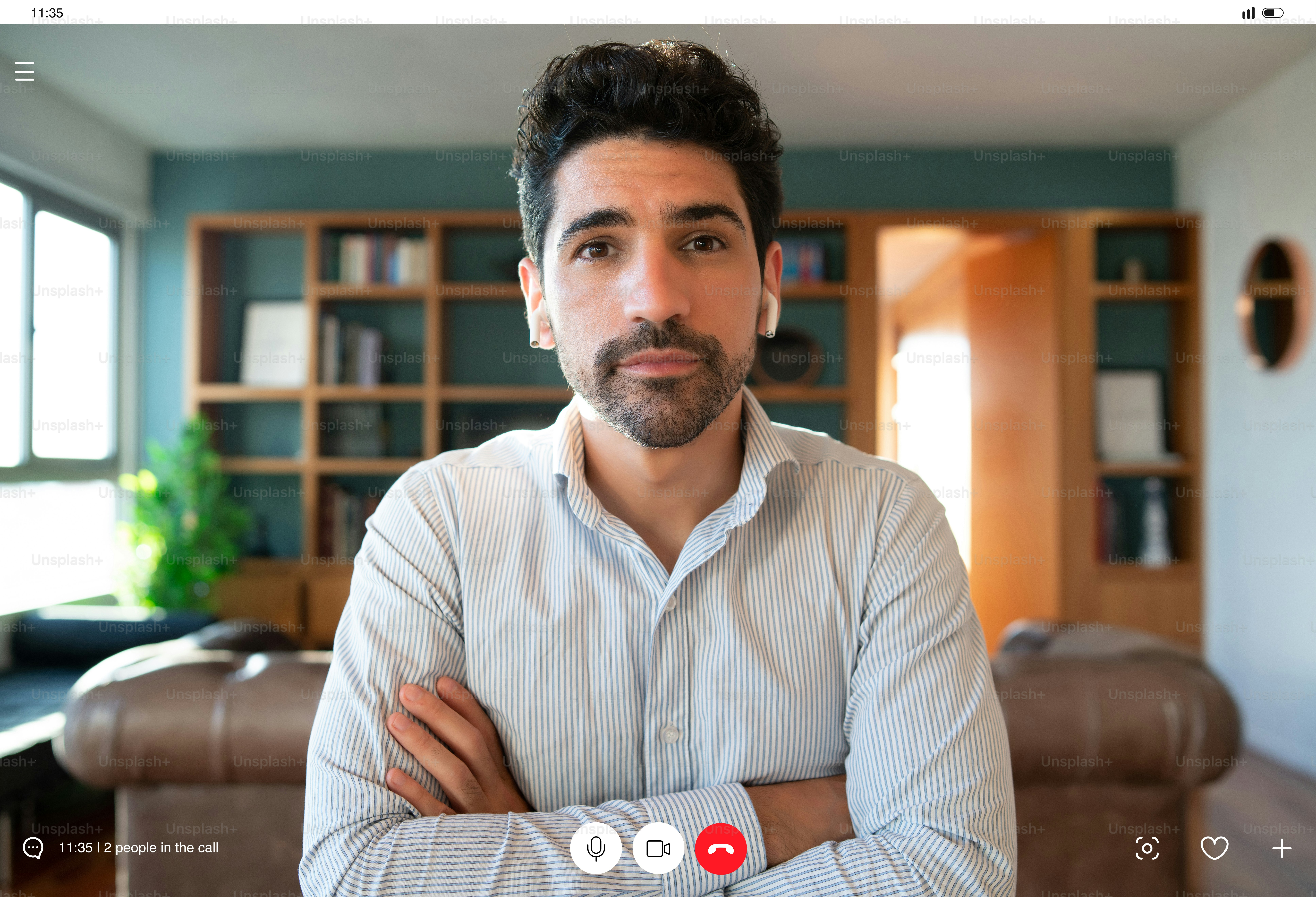 Portrait of young business man on a work video call while staying at home. Home office. New normal lifestyle.