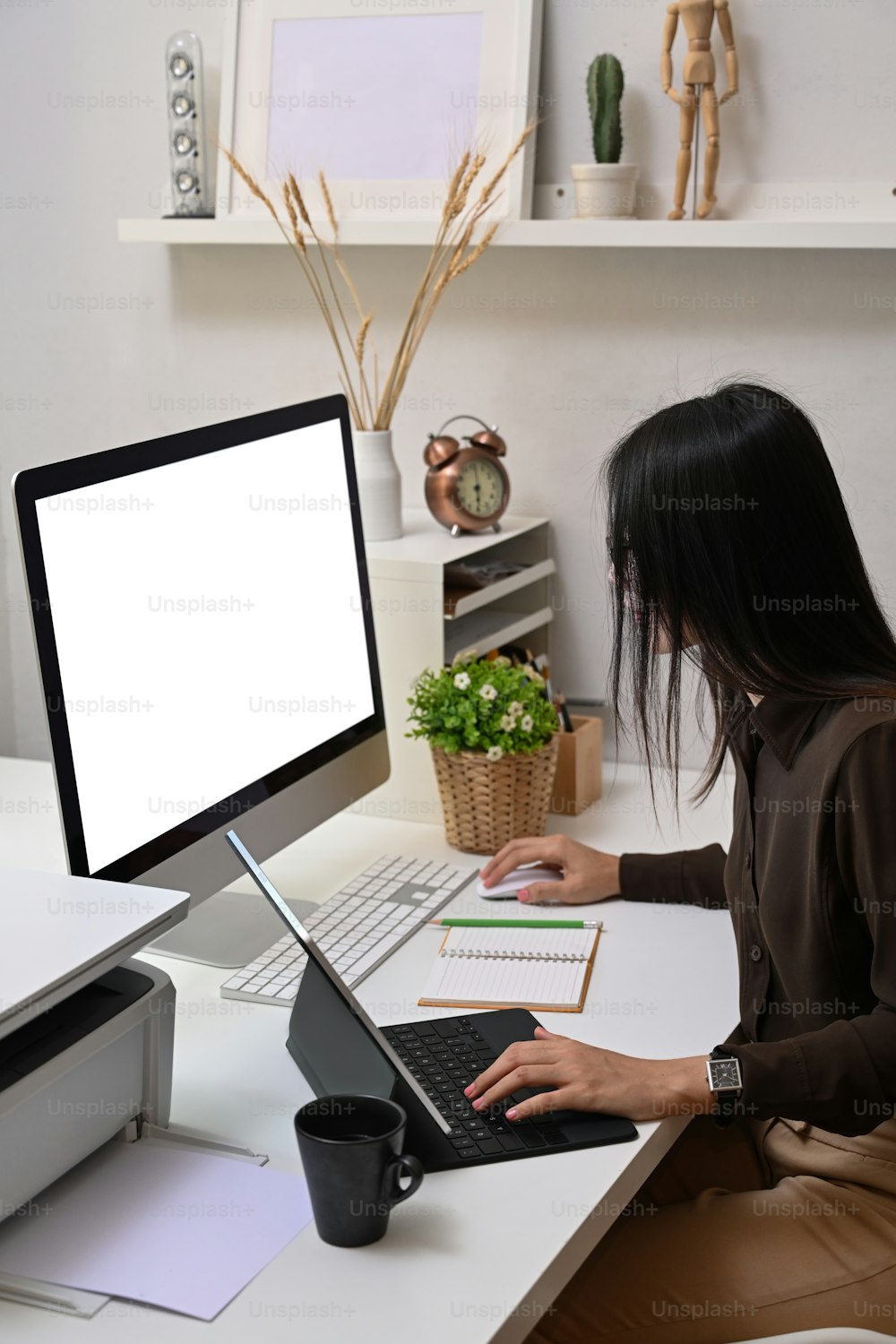 Young woman employee concentrate working on computer at office.