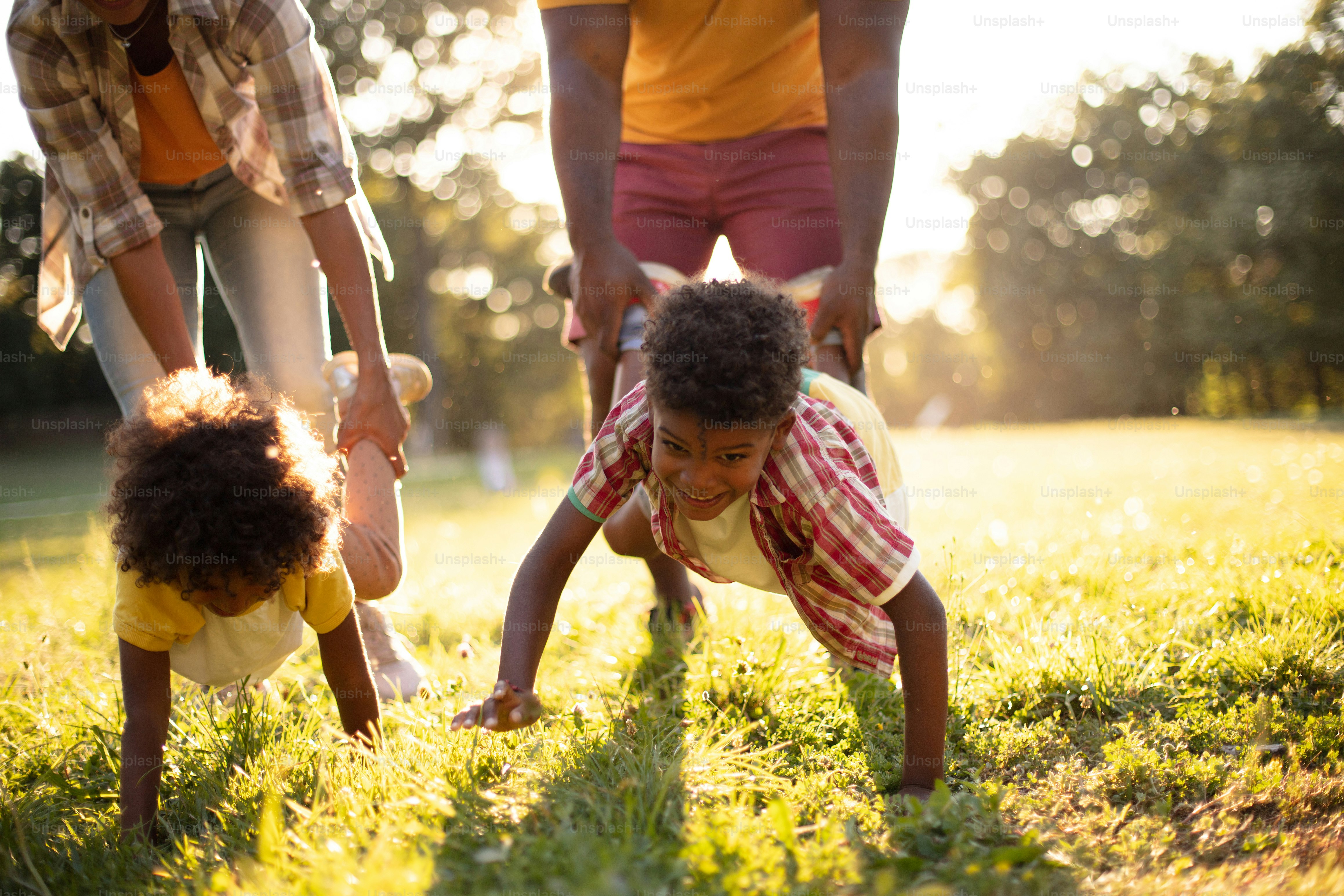 African American family having fun outdoors.