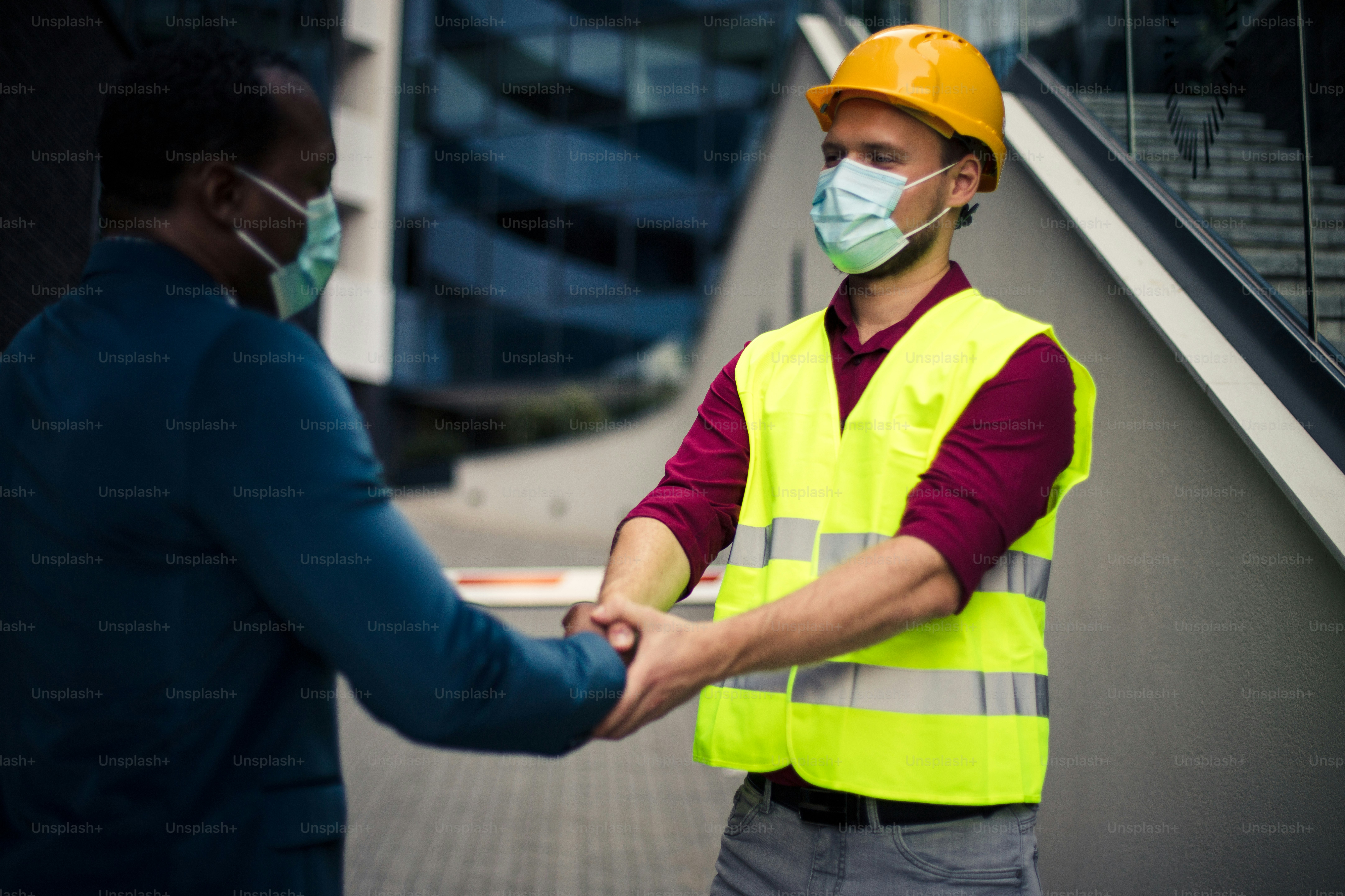 Reaching an agreement on construction site. The construction site boss has a conversation with the architect