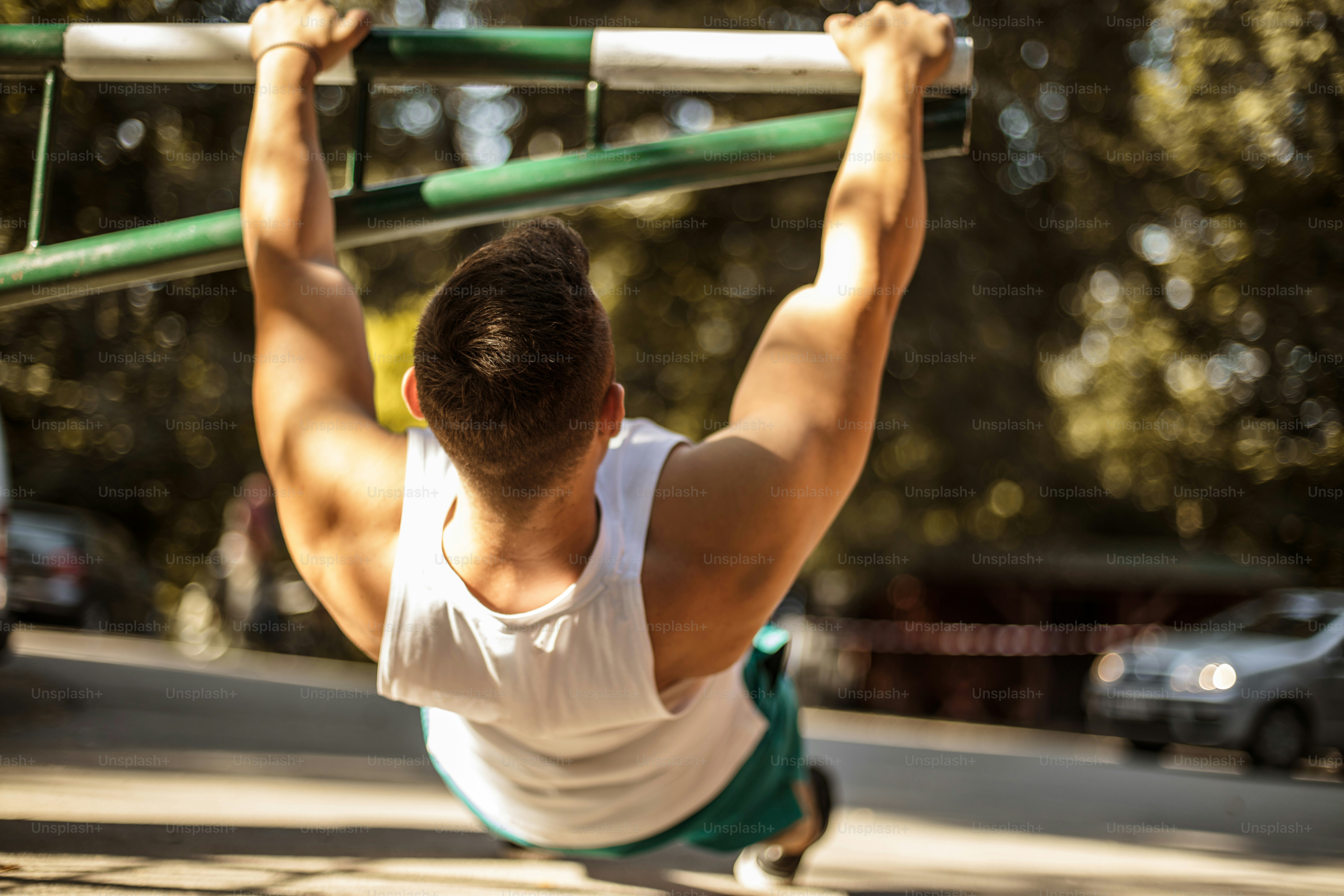 Young man working exercise in the park.