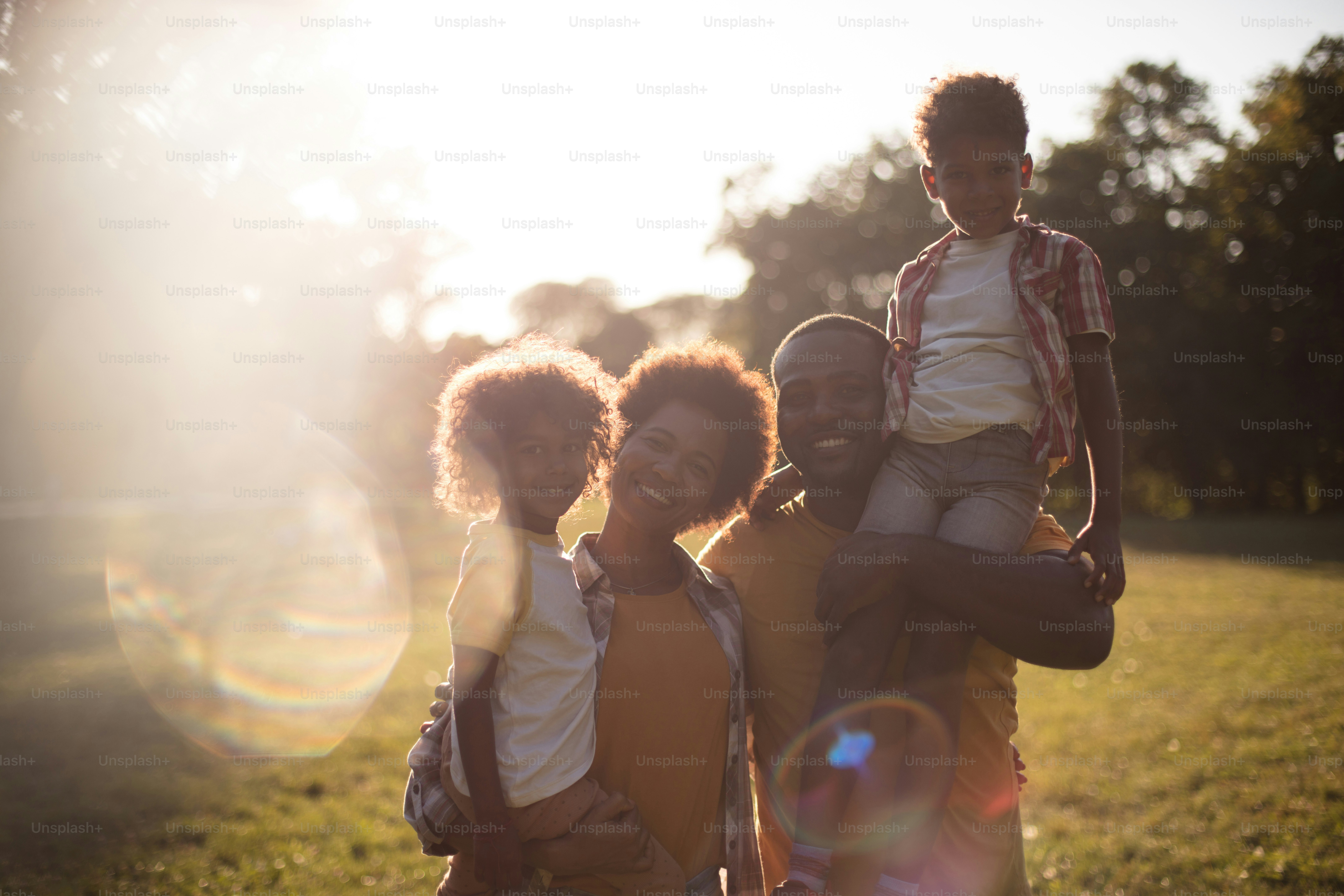 Family is everything.  Portrait of African American family in nature.