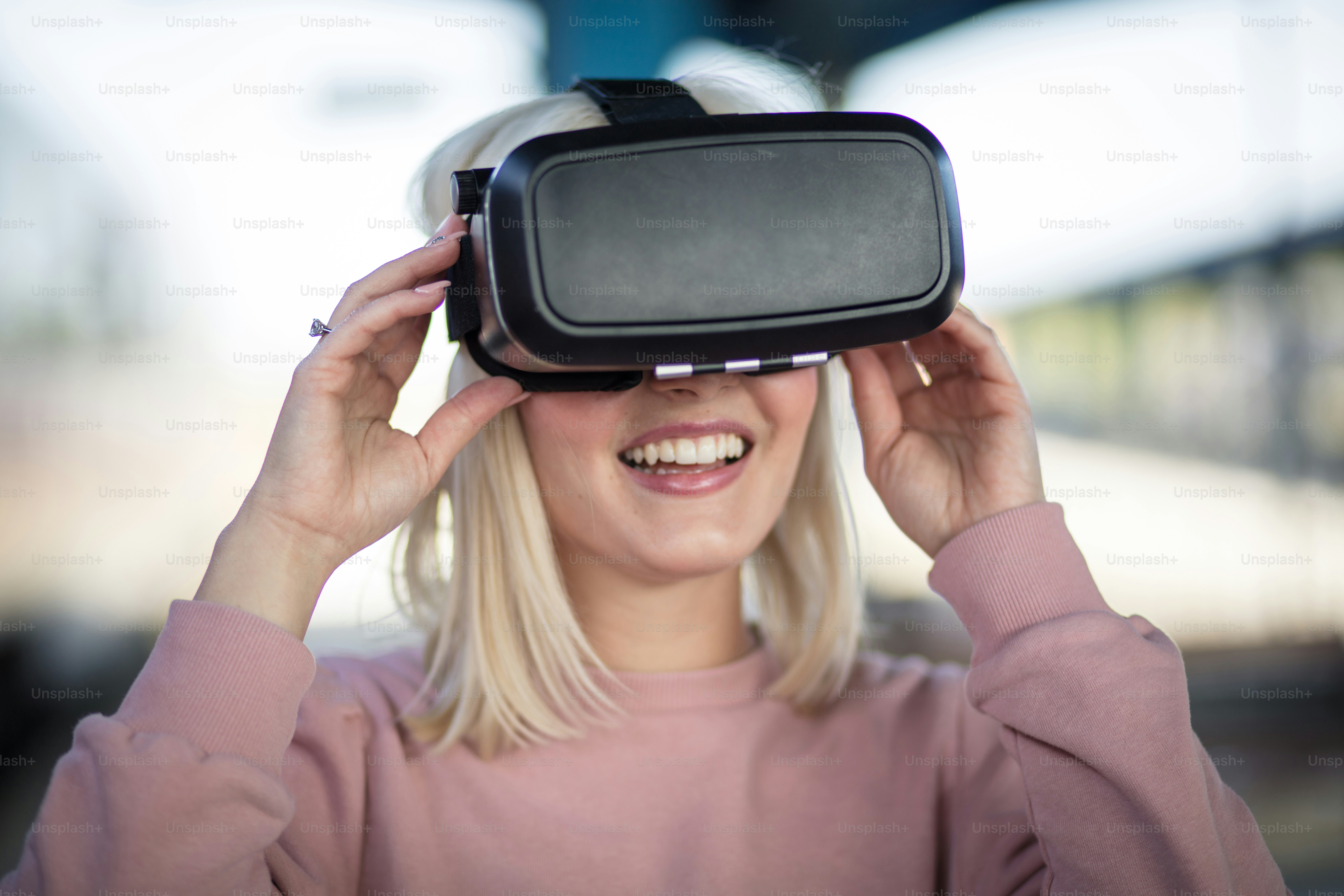 Young woman with VR helmet. Woman on bus station.