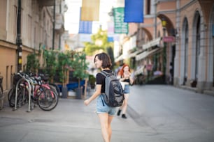 New day for adventure. Tourist woman o street.