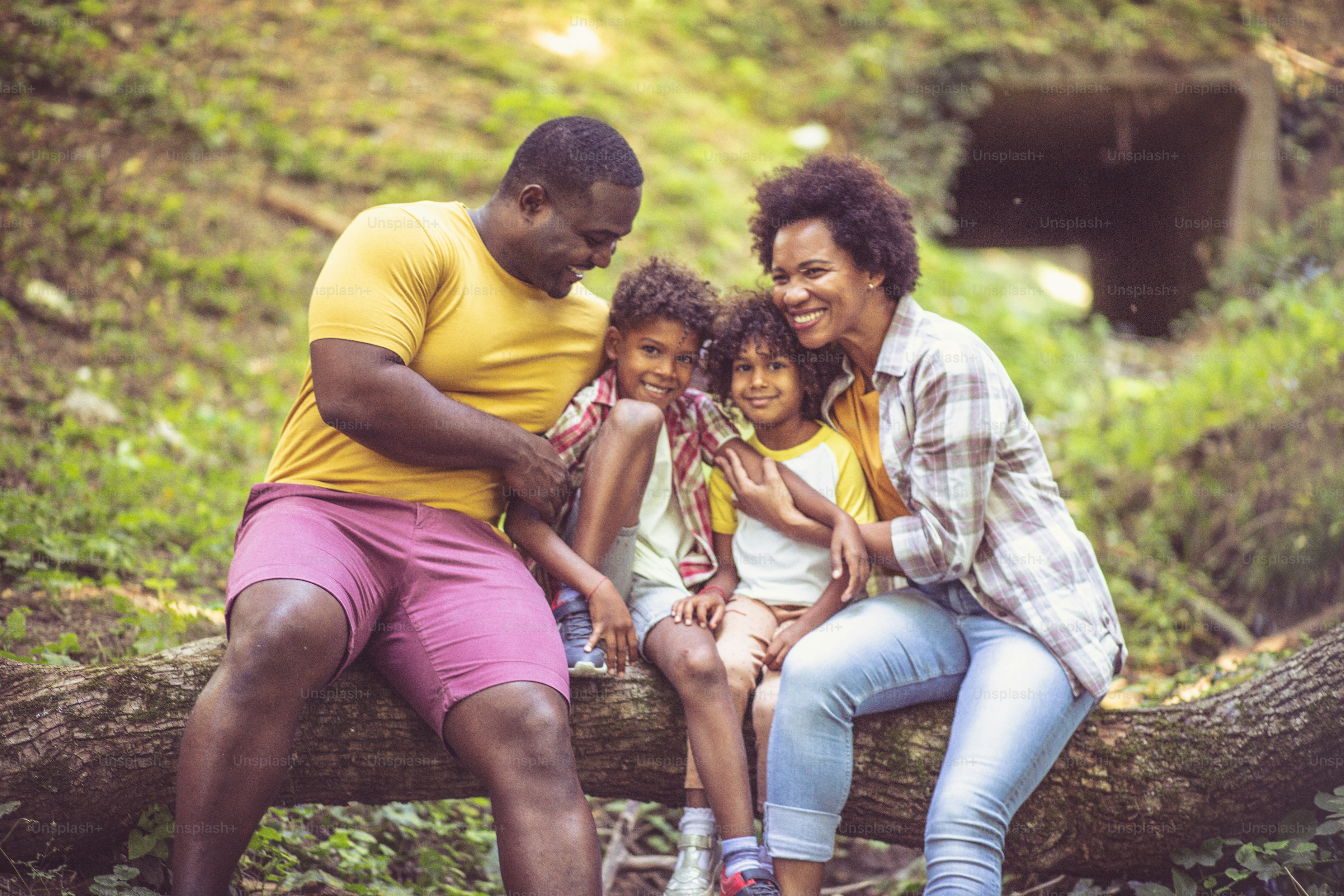 African American family having fun outdoors. Family spending time in nature.