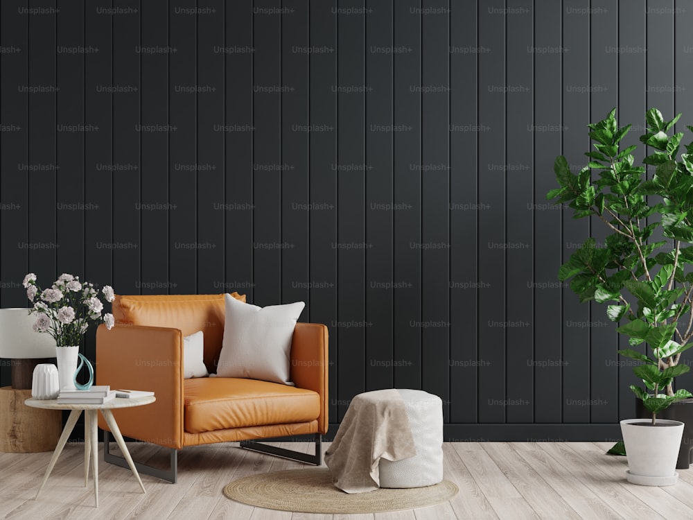 Living room interior wall mockup in dark tones with leather armchair on black wooden wall background.3d rendering