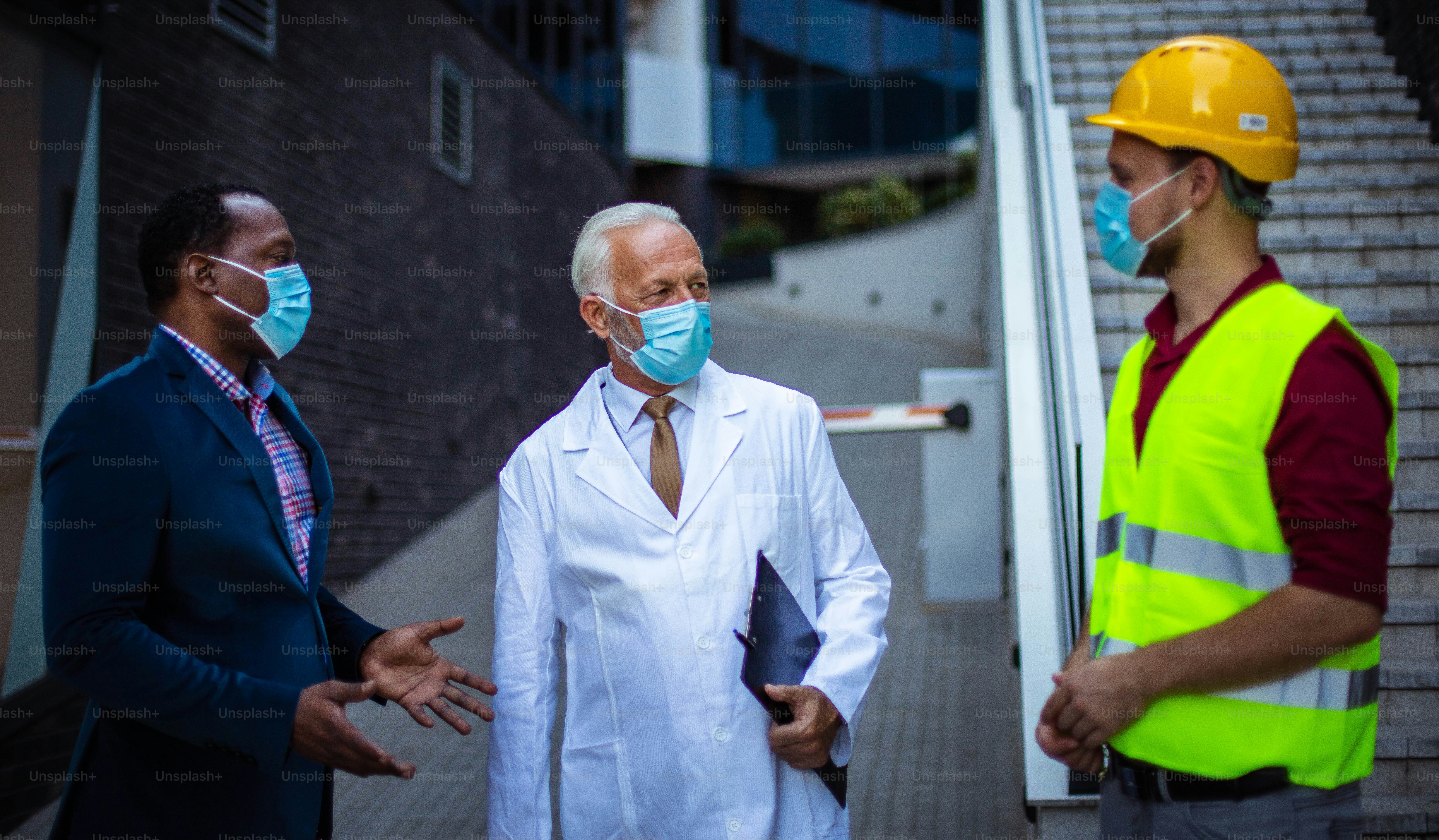 Business man, doctor and engineer on  street.