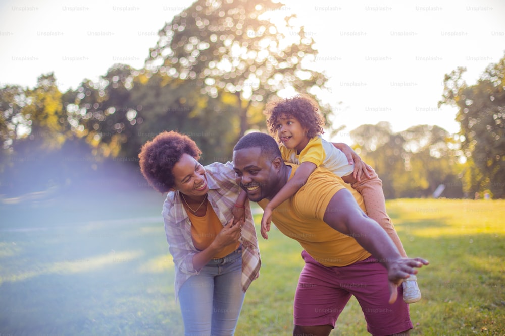 African American family having fun outdoors.