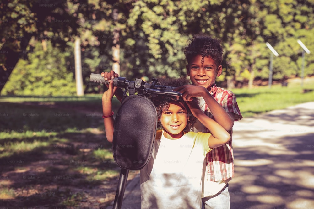 Portrait of little kids.  African American brother and sister in nature.