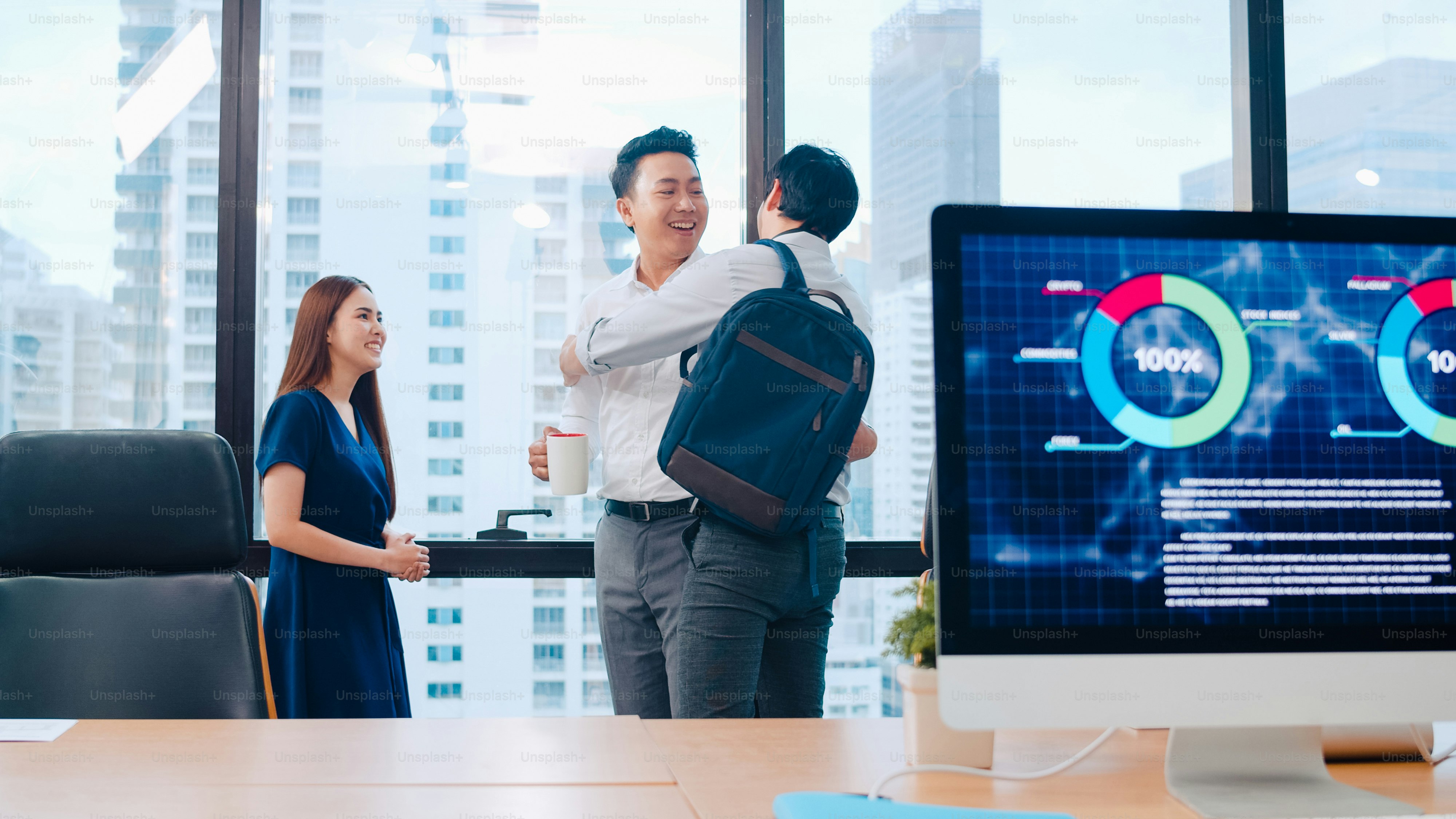 Collaborative process group of multicultural business people in smart casual wear communicating and using technology while working together in creative office. Asia team of young professionals work.