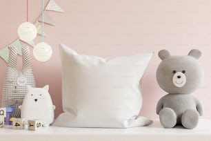 Cuscino mockup nella stanza dei bambini su sfondo parete di colori rosa chiaro.3D Rendering