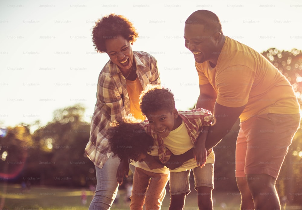 African American family having fun in nature.