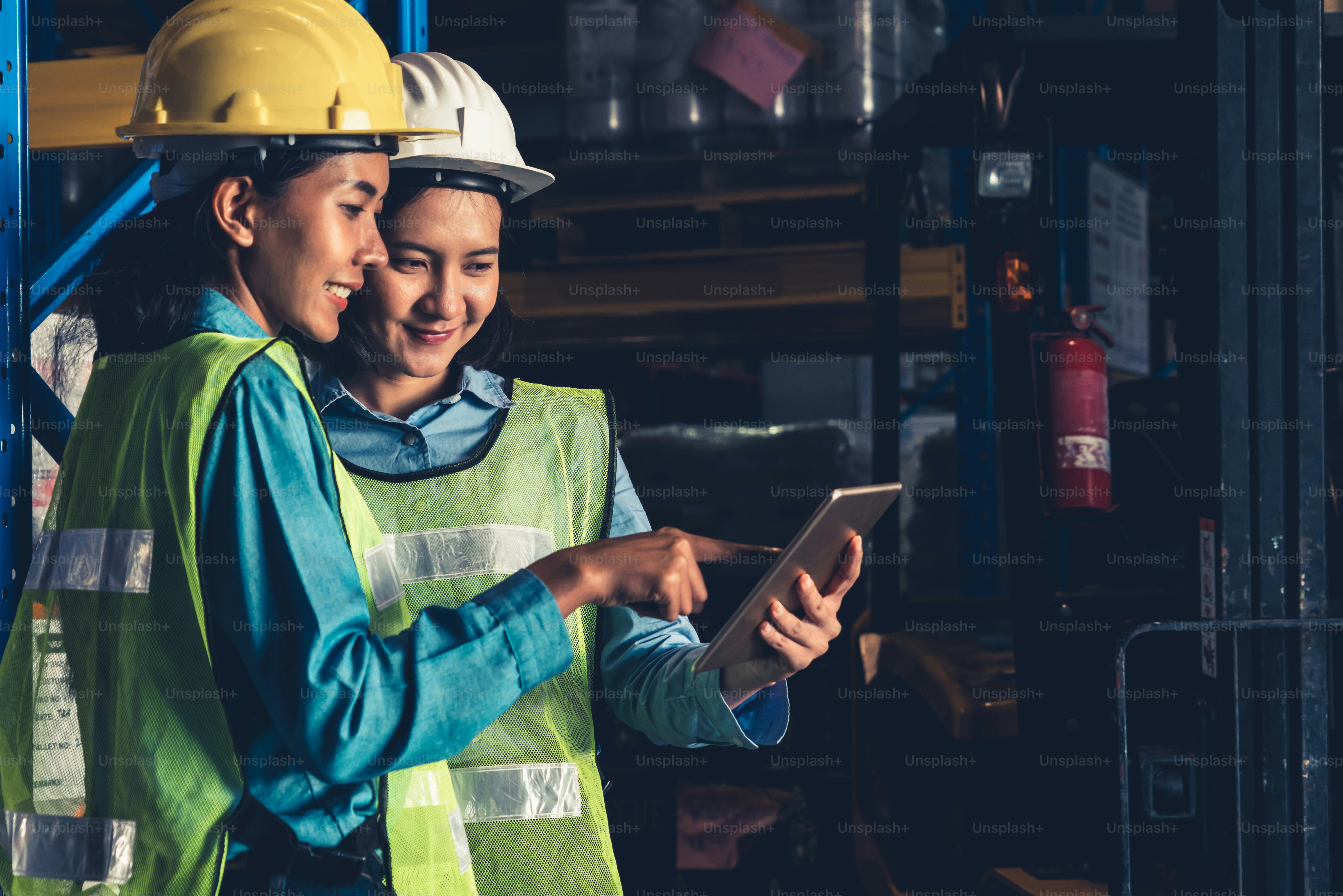Female warehouse worker working at the storehouse . Logistics , supply chain and warehouse business concept .
