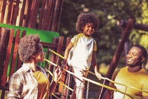 African American family having fun outdoors.