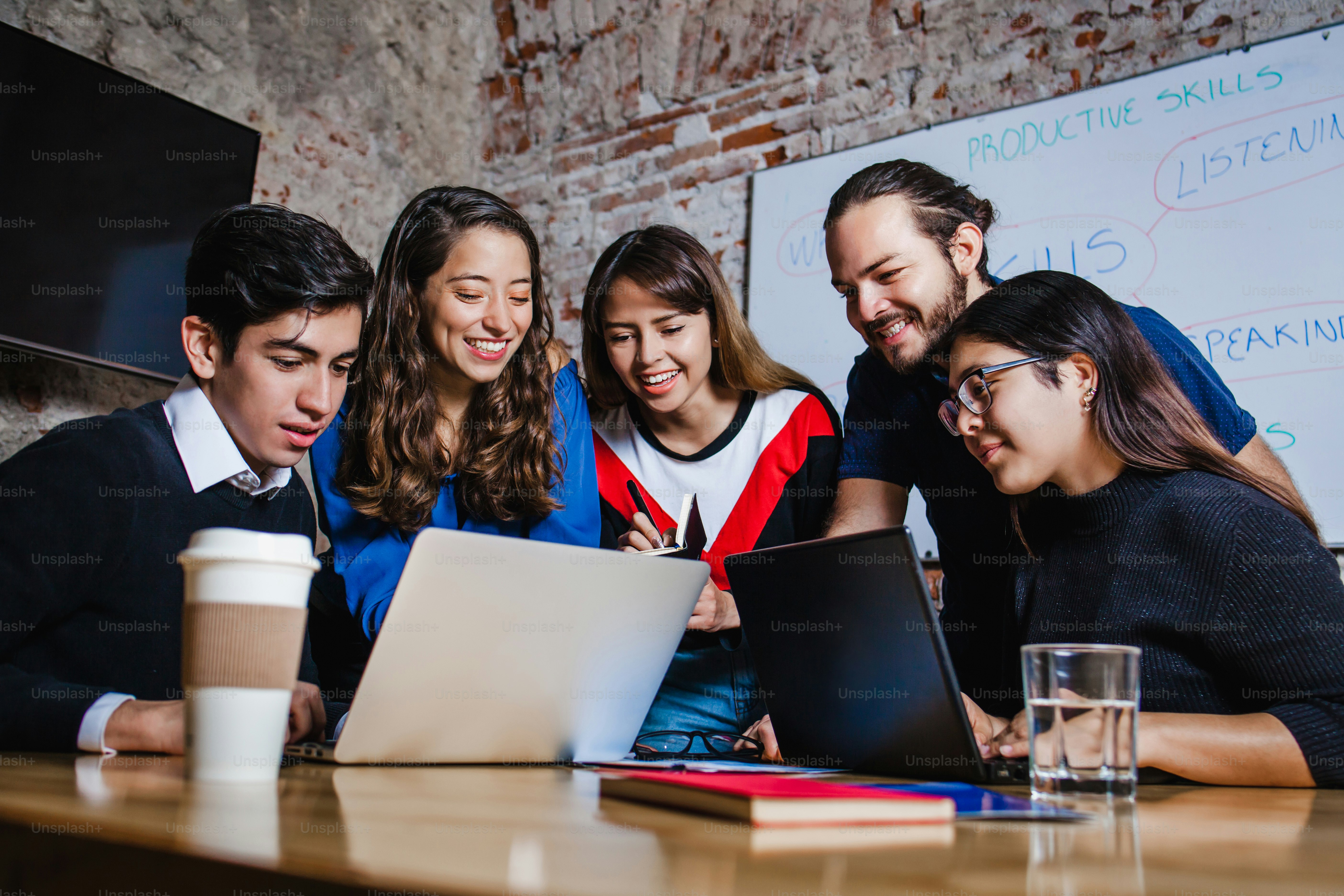 Diverse group of students learning technology