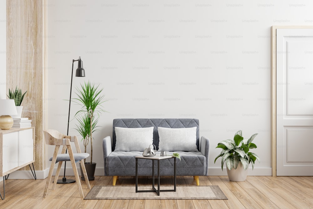Maqueta de pared interior de sala de estar con sofá, sillón y plantas sobre fondo de pared blanca vacía. Representación 3d