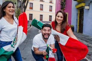 Mexican people with flags to celebrate mexican independence day in Mexico