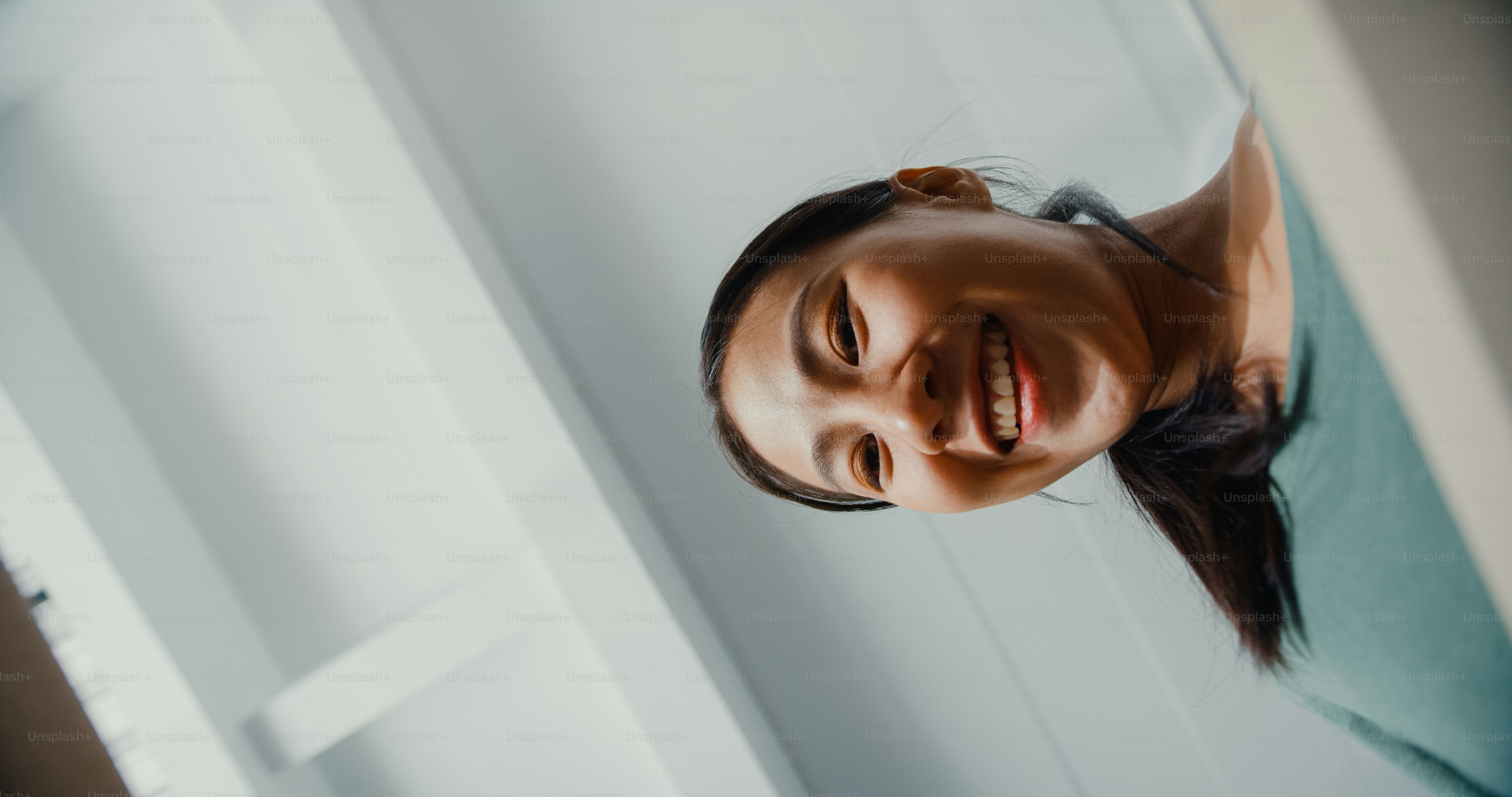 Excited Asia young woman unpack opening huge carton box and looking inside new gift at home. Happy millennial lady client satisfied with ordered purchase. Delivery and online shopping concept.