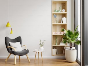 Minimalistisches Interieur des Wohnzimmers mit Design-Sessel und Tisch an weißer Wand.3D Rendering