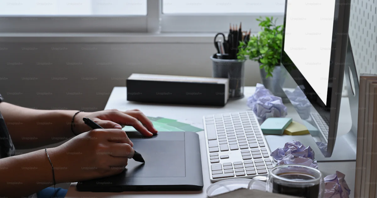 Person Using Computer Making Designs Man graphic designer working with modern computer and graphic tablet ...