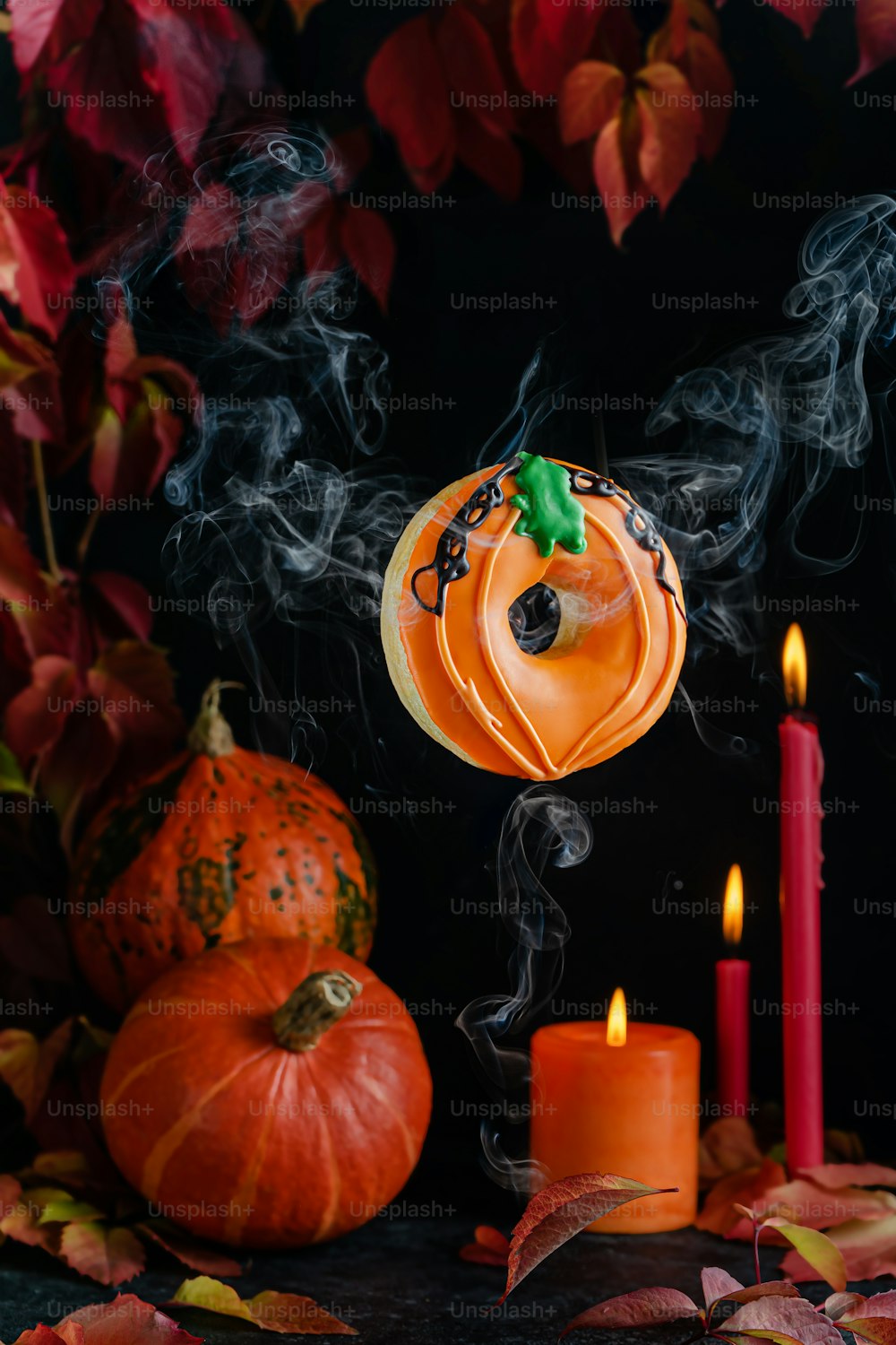 Flying pumpkin donut on dark Halloween background. Greeting card