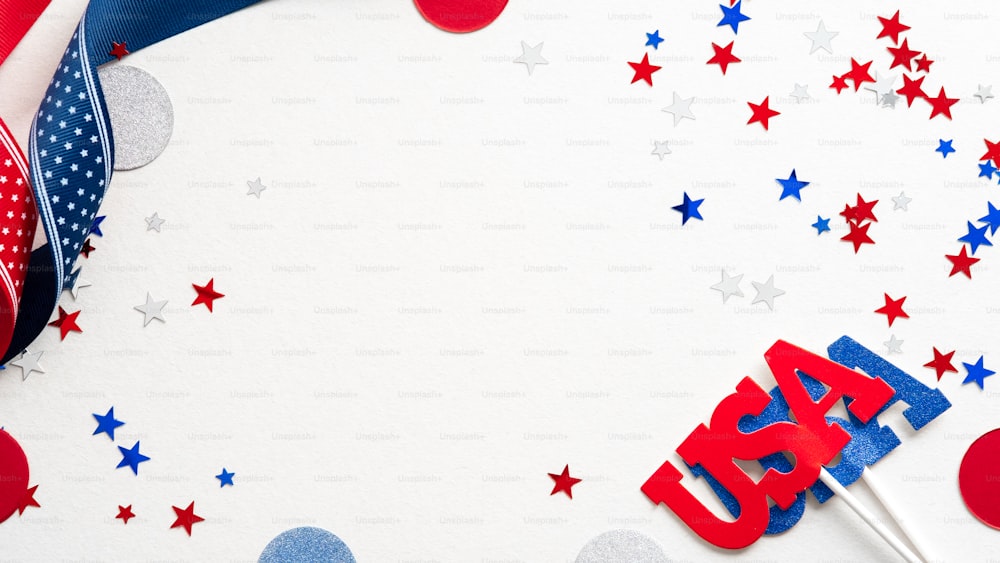 Happy Presidents Day concept. Grosgrain ribbon and confetti stars on white background with copy space. Web banner template for USA Independence day or Columbus Day.