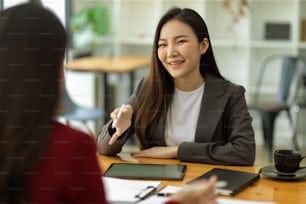 Businesswomen interviewing new employee, business talk negotiation with female business partner or job candidate in the office. employment