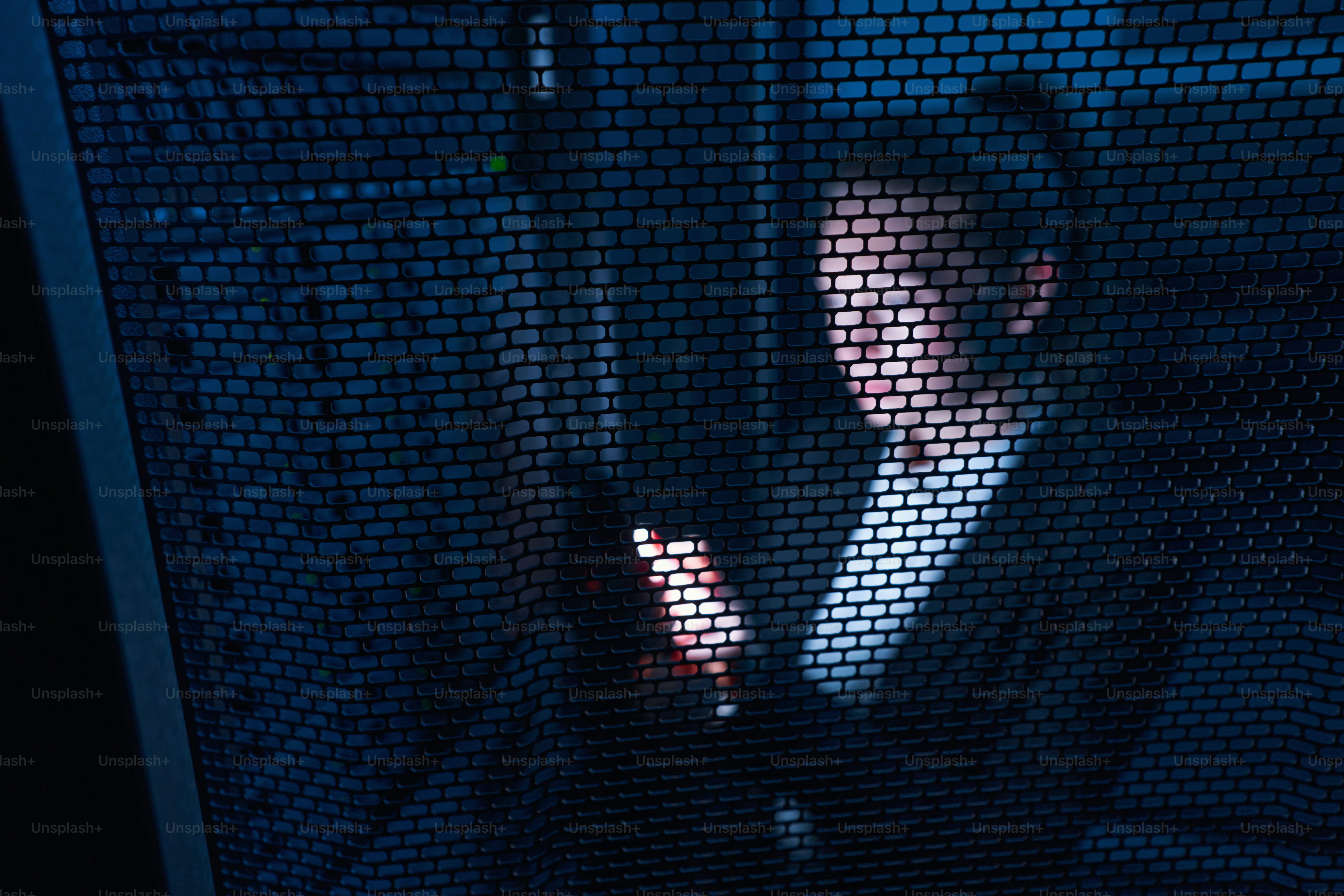 Abstract view of female system administrator in server room of modern data center