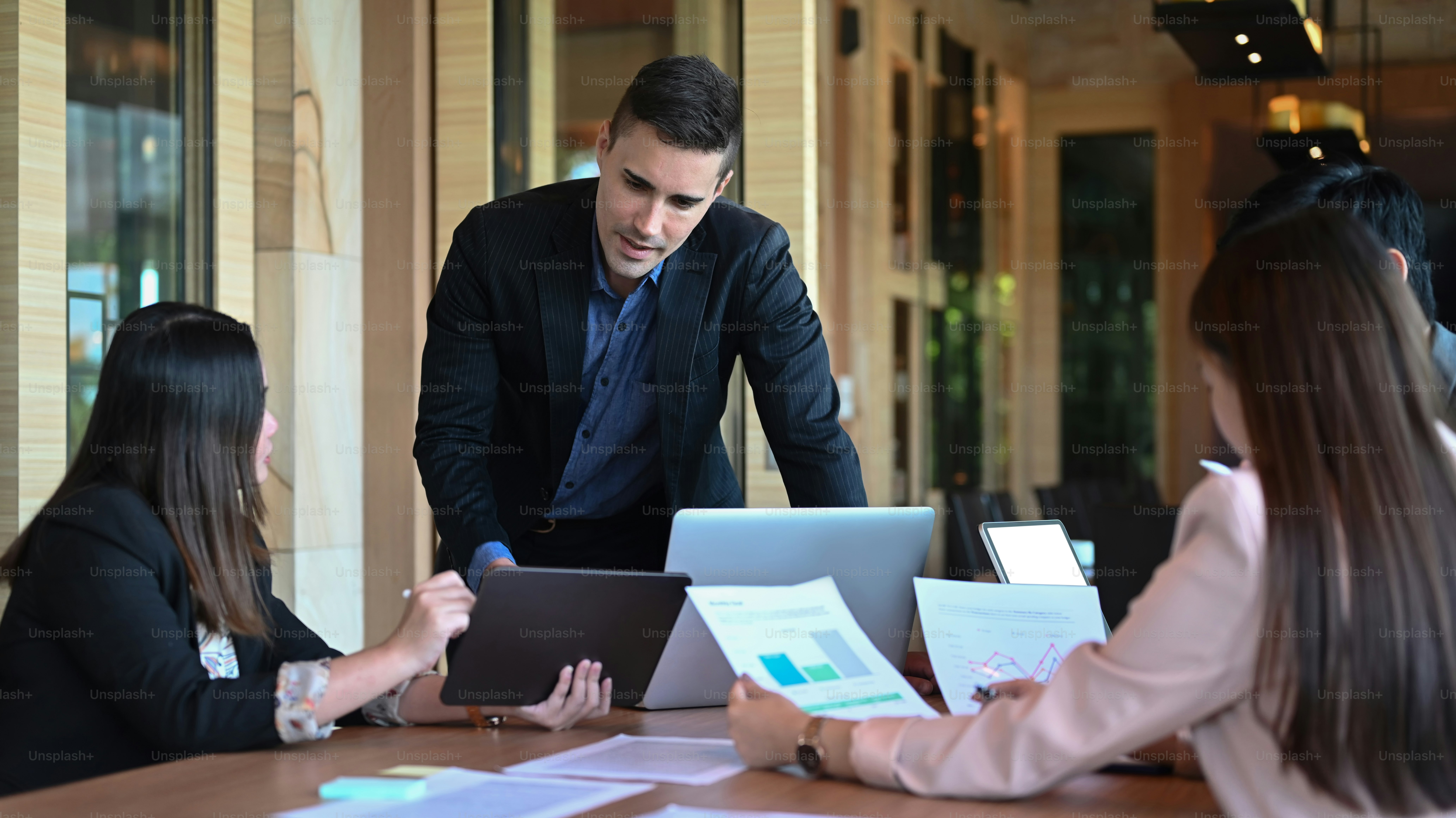 Professional businesspeople meeting in the boardroom.